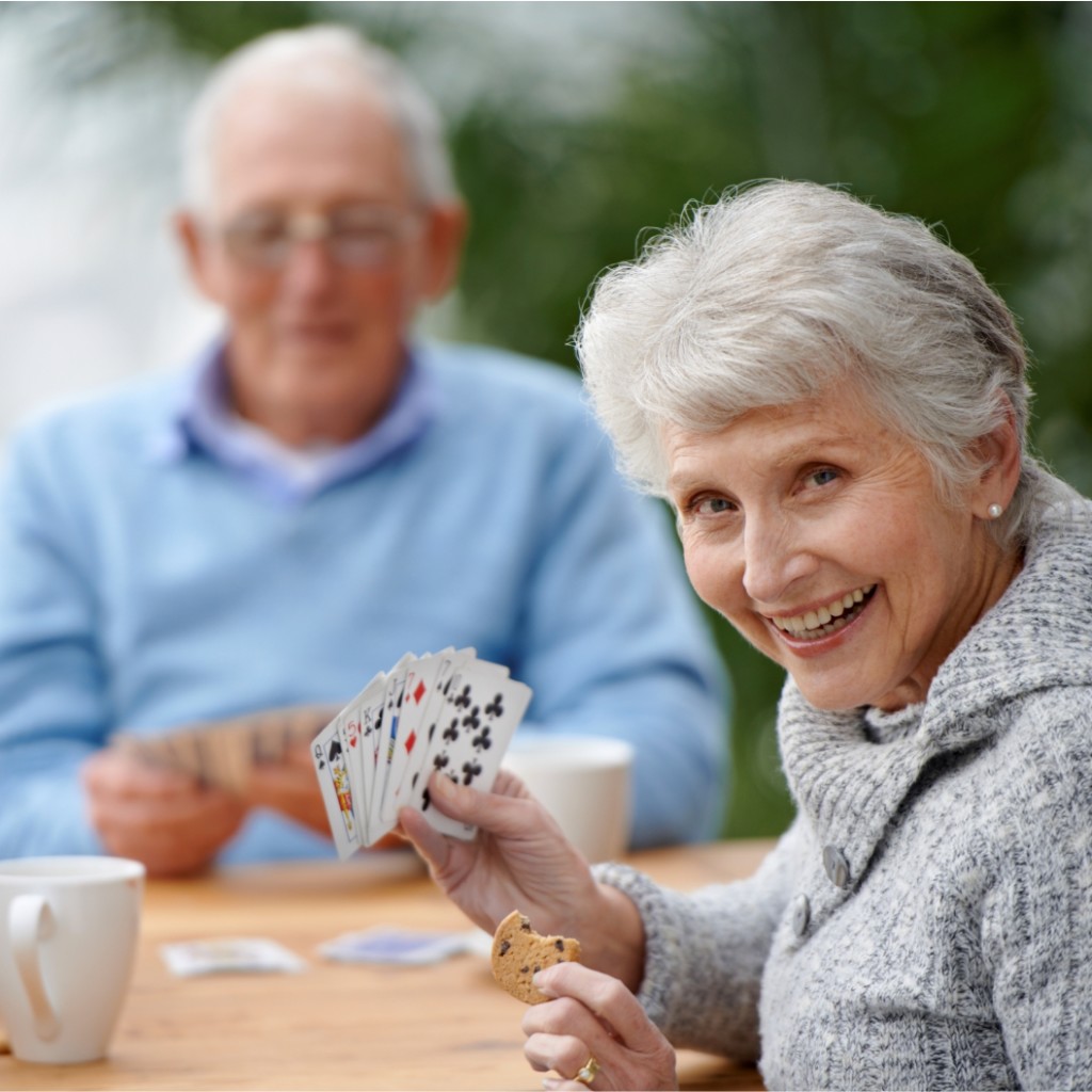 Seniors Playing Cards at Arbor Court Topeka - Independant Living & Retirement Apartments